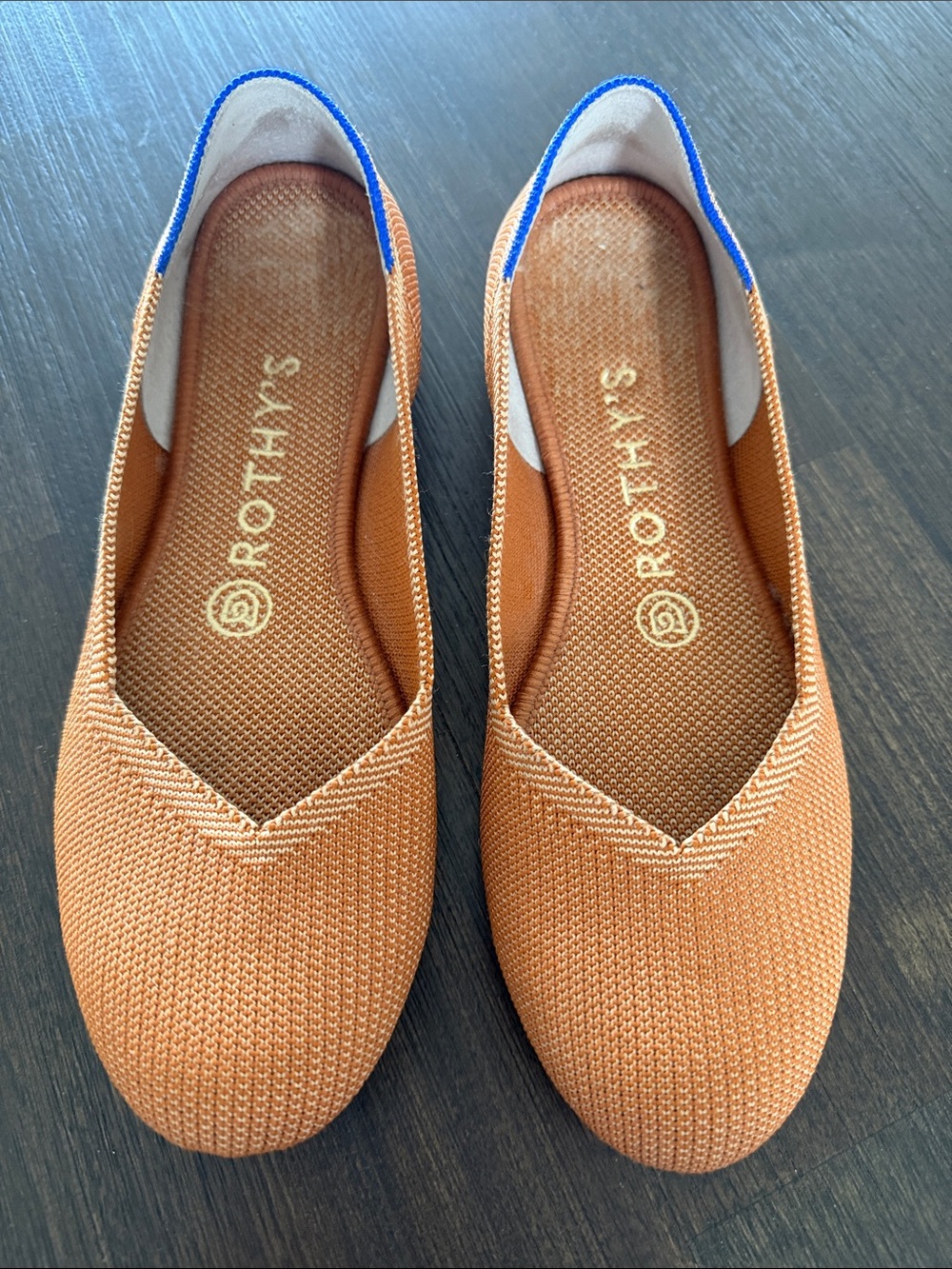 Rothy's Women's Round Toe Flats in Rust with Blue Heel Trim